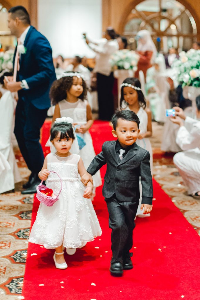 flower girl flower boy march in wedding